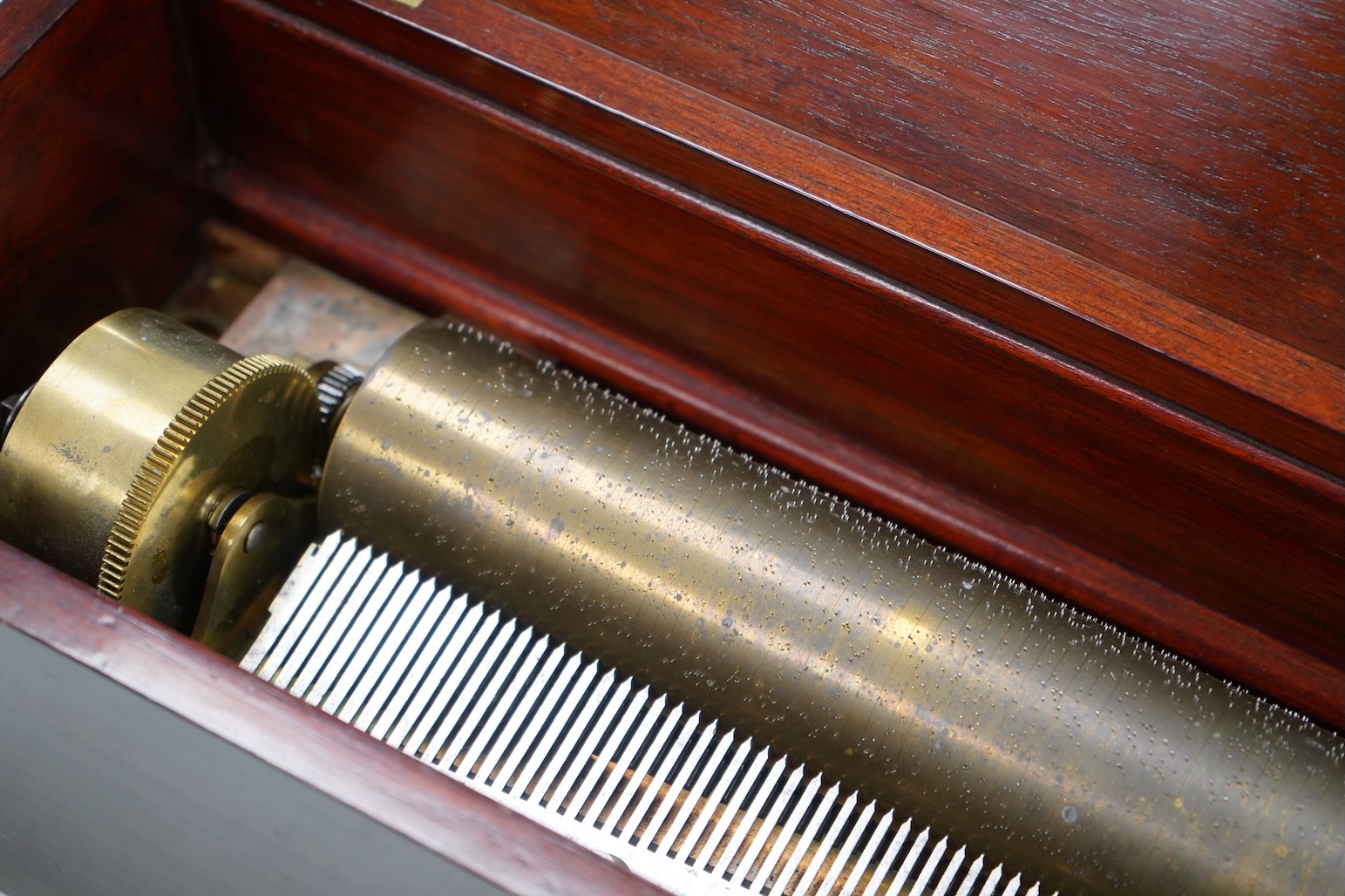 A 19th century Swiss rosewood and marquetry cased cylinder music box, by Nicole Freres, with engraved serial number 11039, the cylinder is 32.5cm long, the case; 51cm wide, 15cm high, 17cm deep